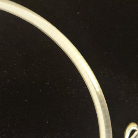 Omega and bold pendant